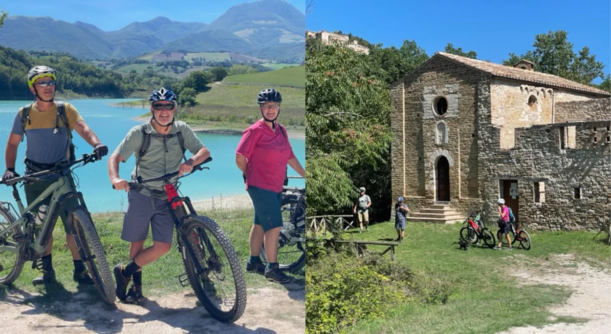 E-MTB-Gruppe am See und an einer alten Kirche in den Marken